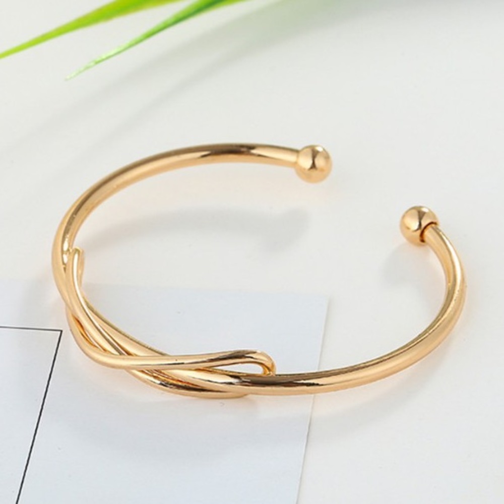 Minimalist bow cuff style gold bracelet